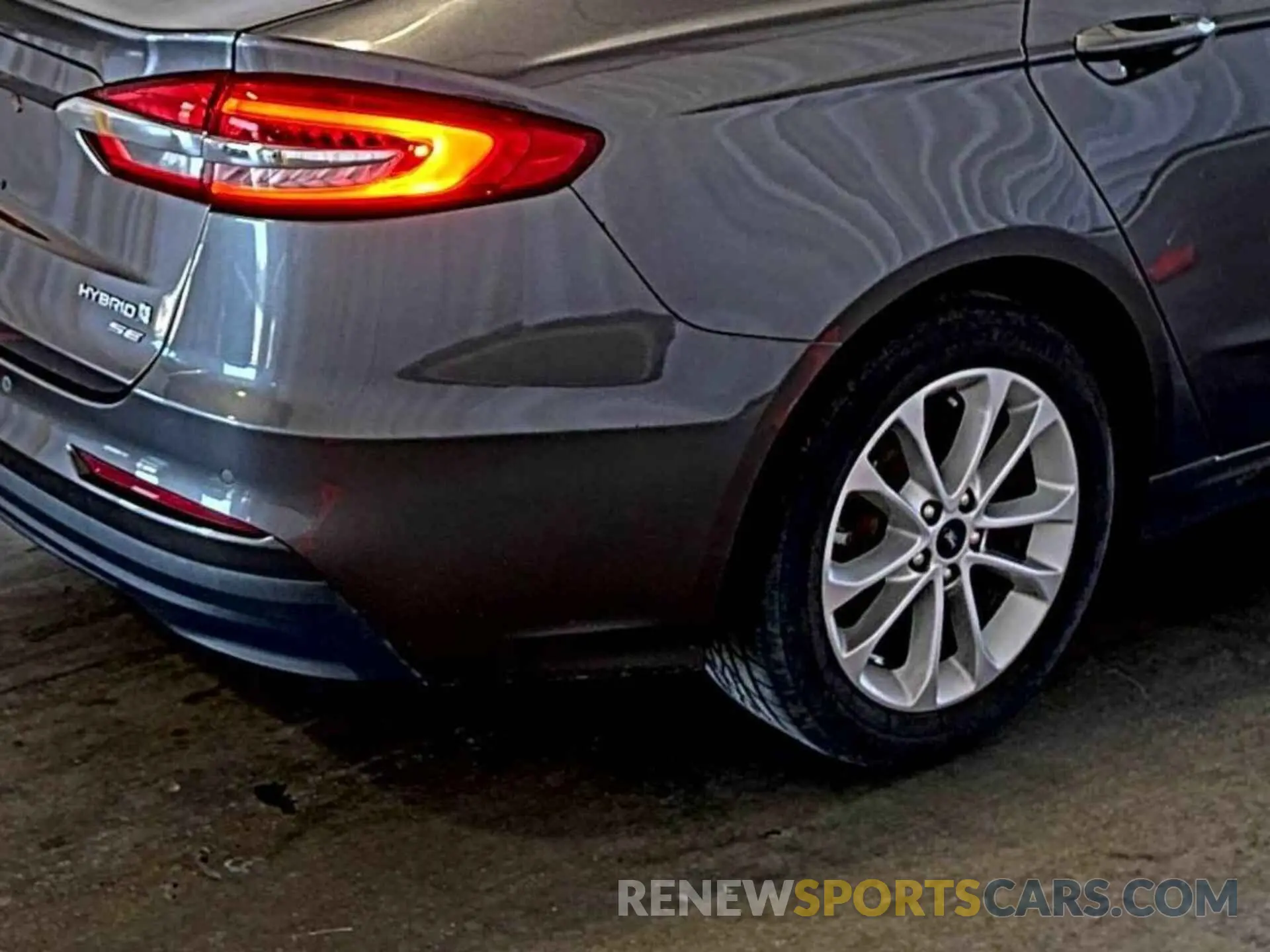 7 Фотография поврежденного автомобиля 3FA6P0LU0KR255633 FORD FUSION HYBRID 2019