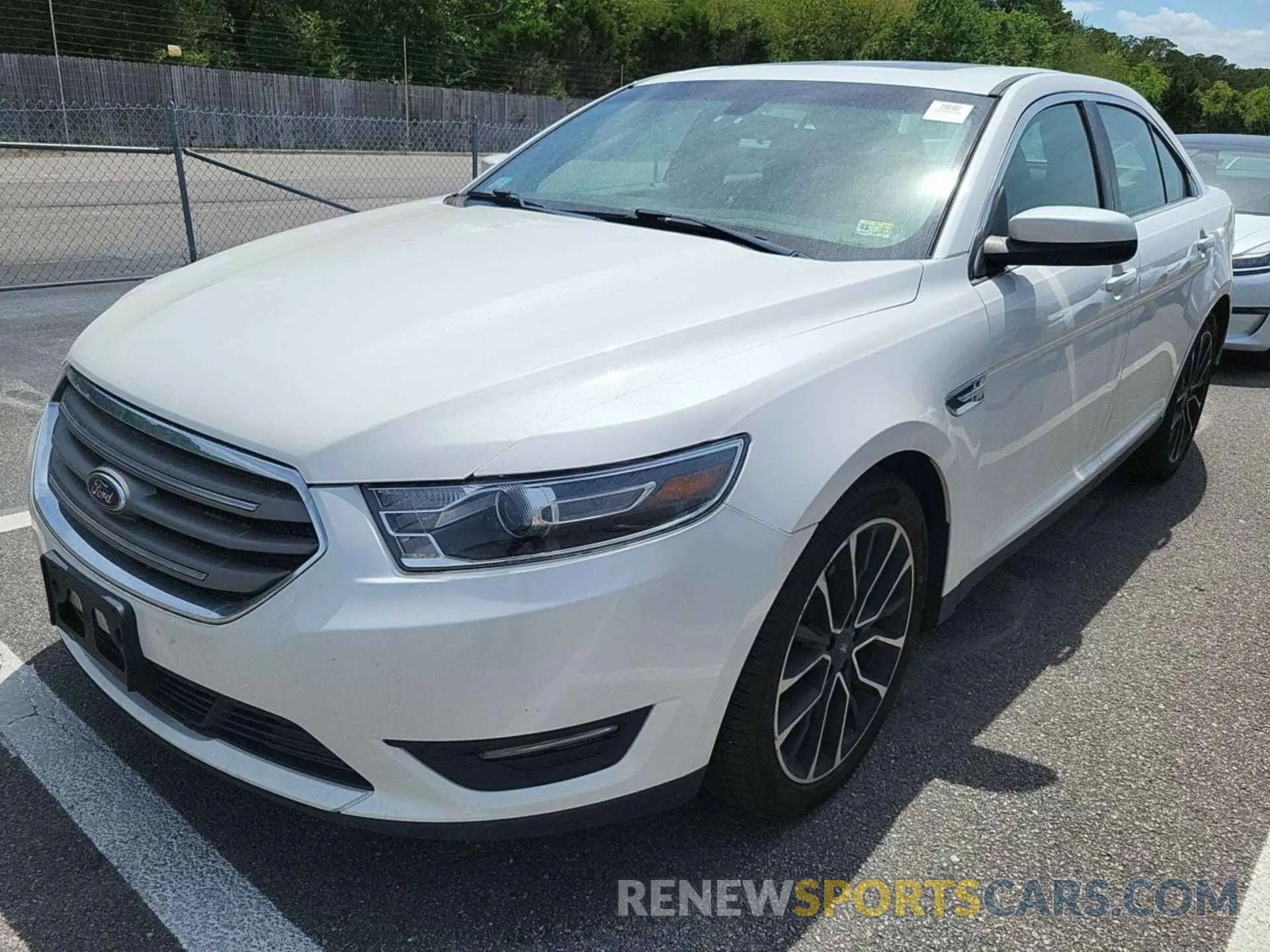 27 Photograph of a damaged car 1FAHP2E82KG100559 FORD TAURUS 2019