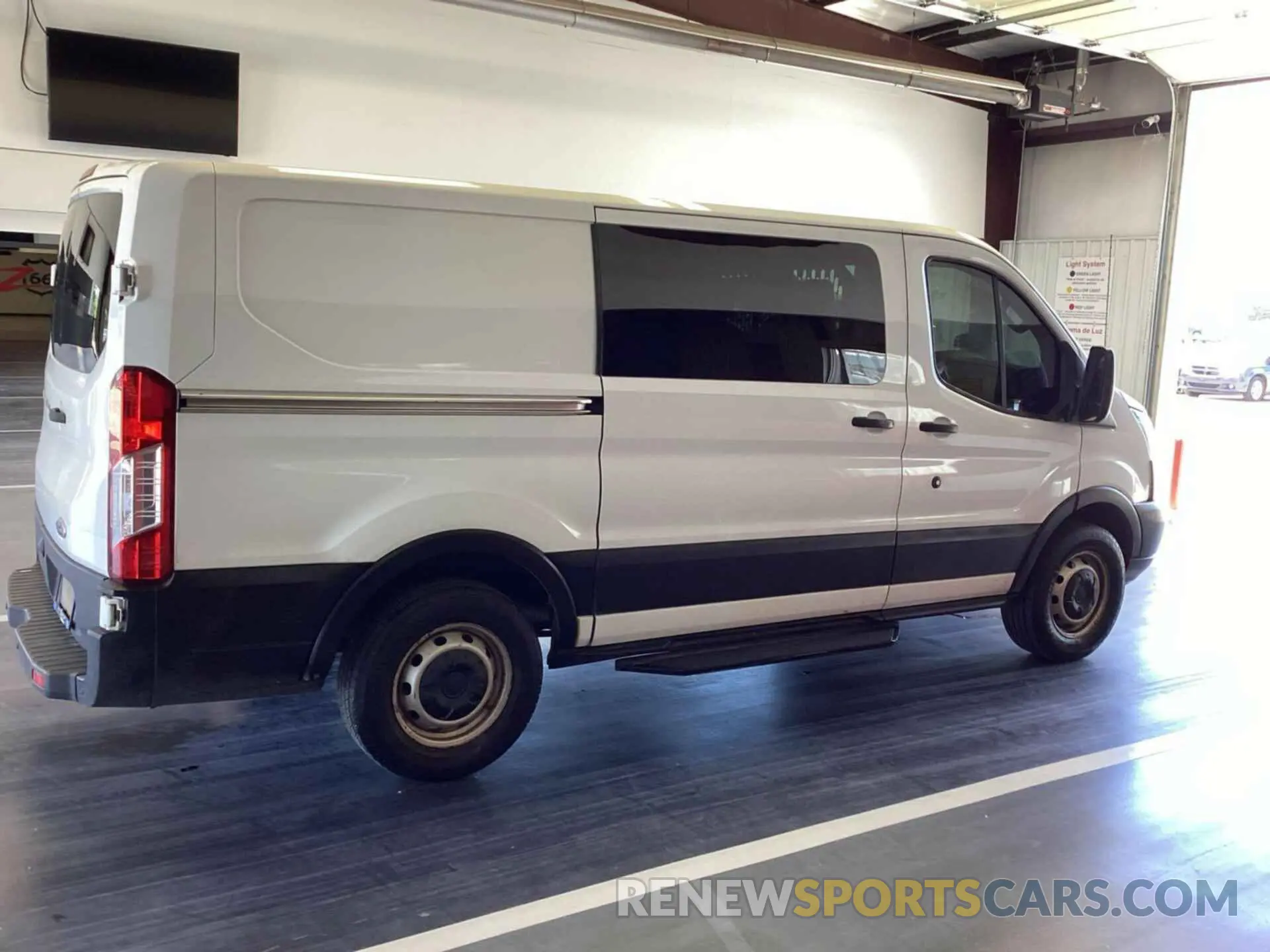12 Photograph of a damaged car 1FTYE1YM0KKB28327 FORD TRANSIT-150 2019
