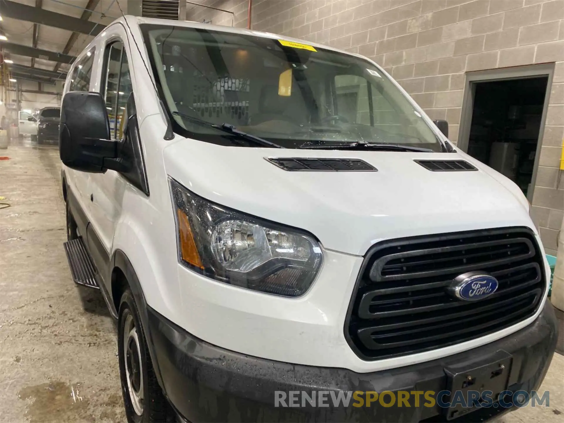23 Photograph of a damaged car 1FTYE1YM0KKB31924 FORD TRANSIT-150 2019