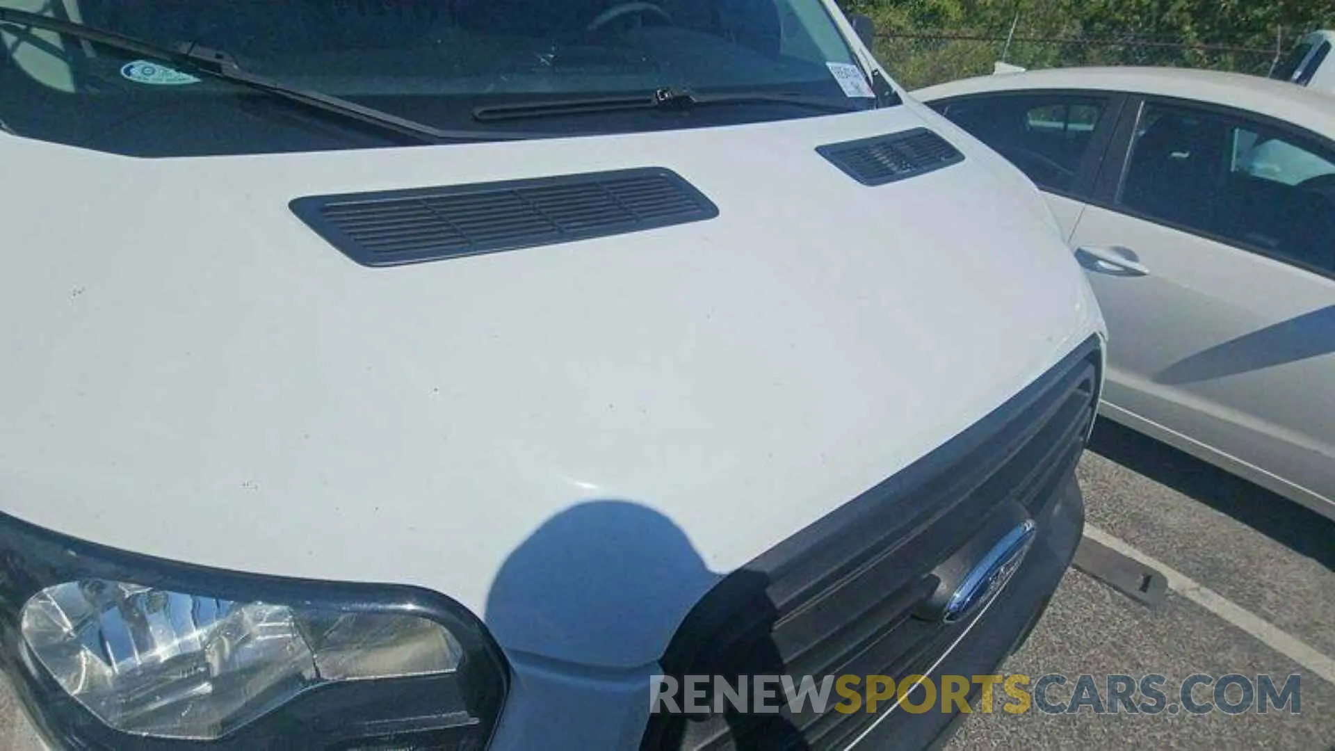 12 Photograph of a damaged car 1FTYE1YM2KKB31911 FORD TRANSIT 2019