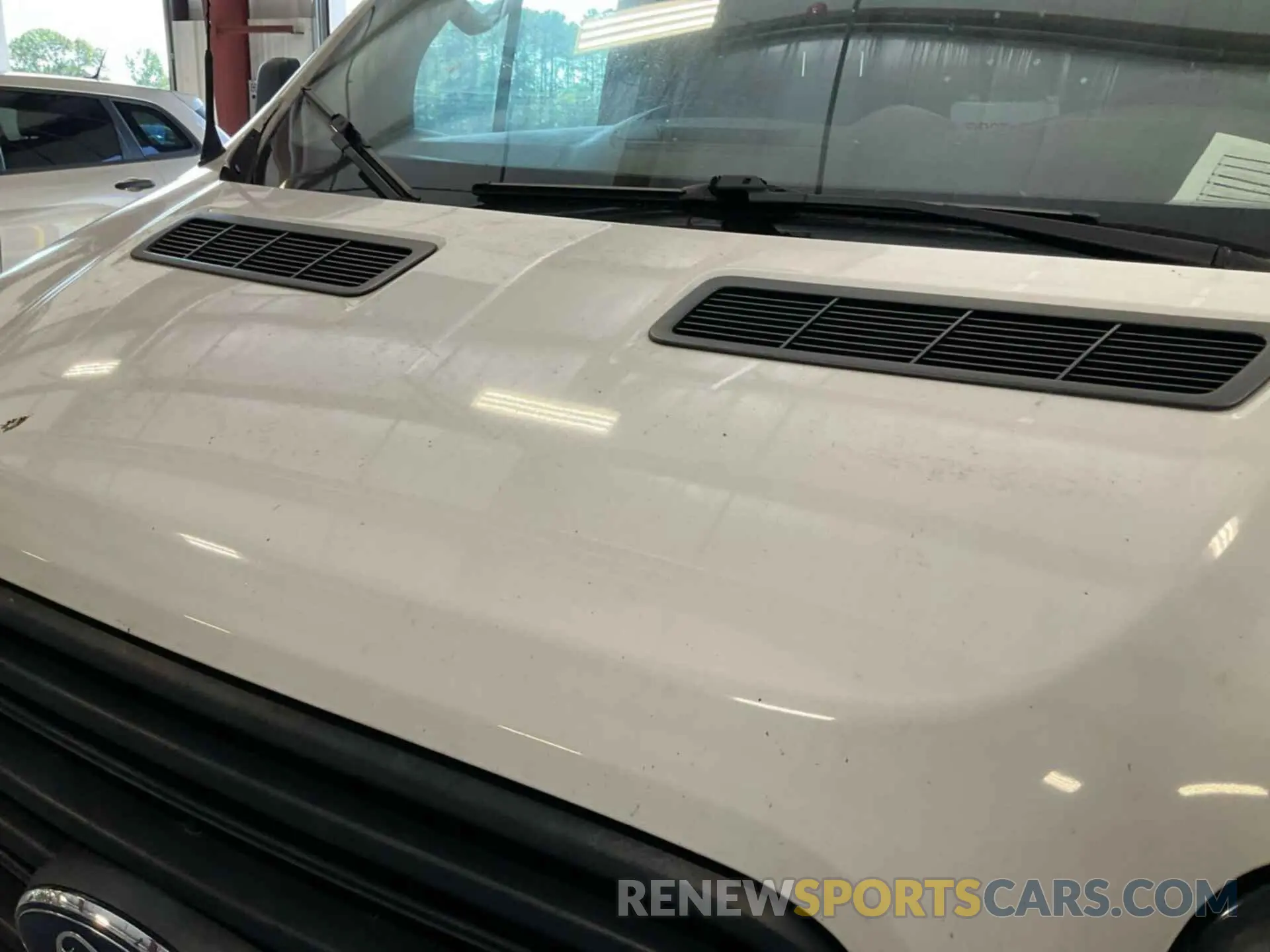 32 Фотография поврежденного автомобиля 1FTYR1YM5KKA24761 FORD TRANSIT 2019