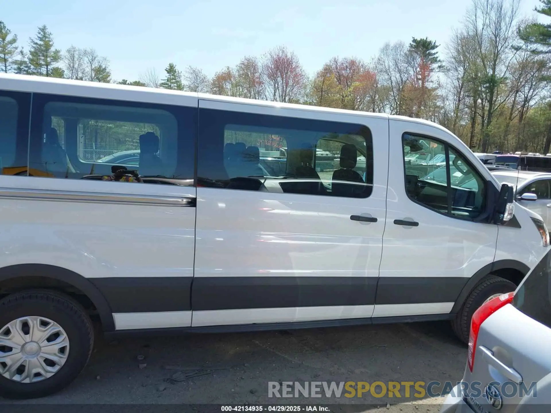 14 Photograph of a damaged car 1FBAX2Y88RKA15681 FORD TRANSIT-350 PASSENGER VAN 2024