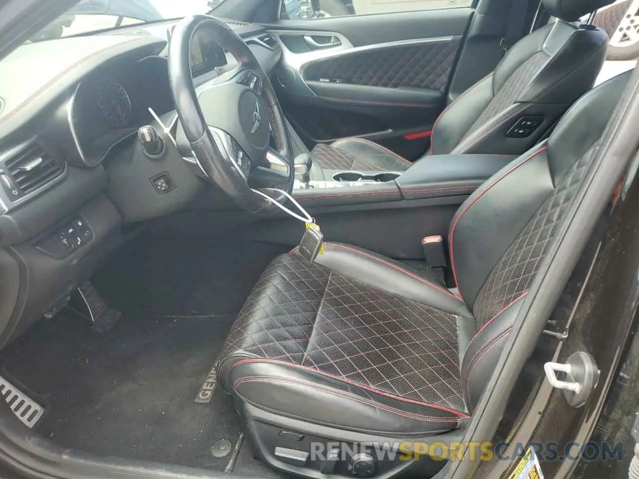 7 Photograph of a damaged car KMTG34LE2KU014662 GENESIS G70 2019