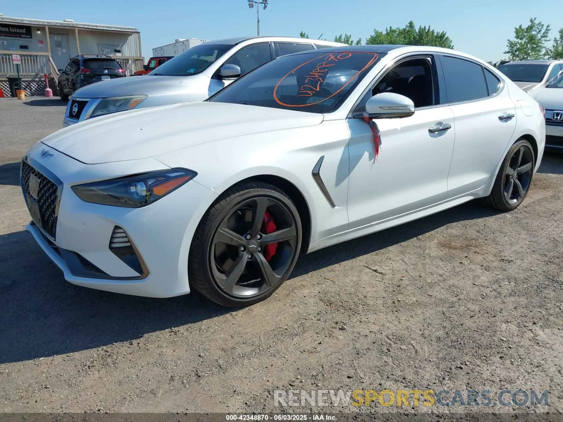 2 Photograph of a damaged car KMTG34LE6MU073393 GENESIS G70 2021