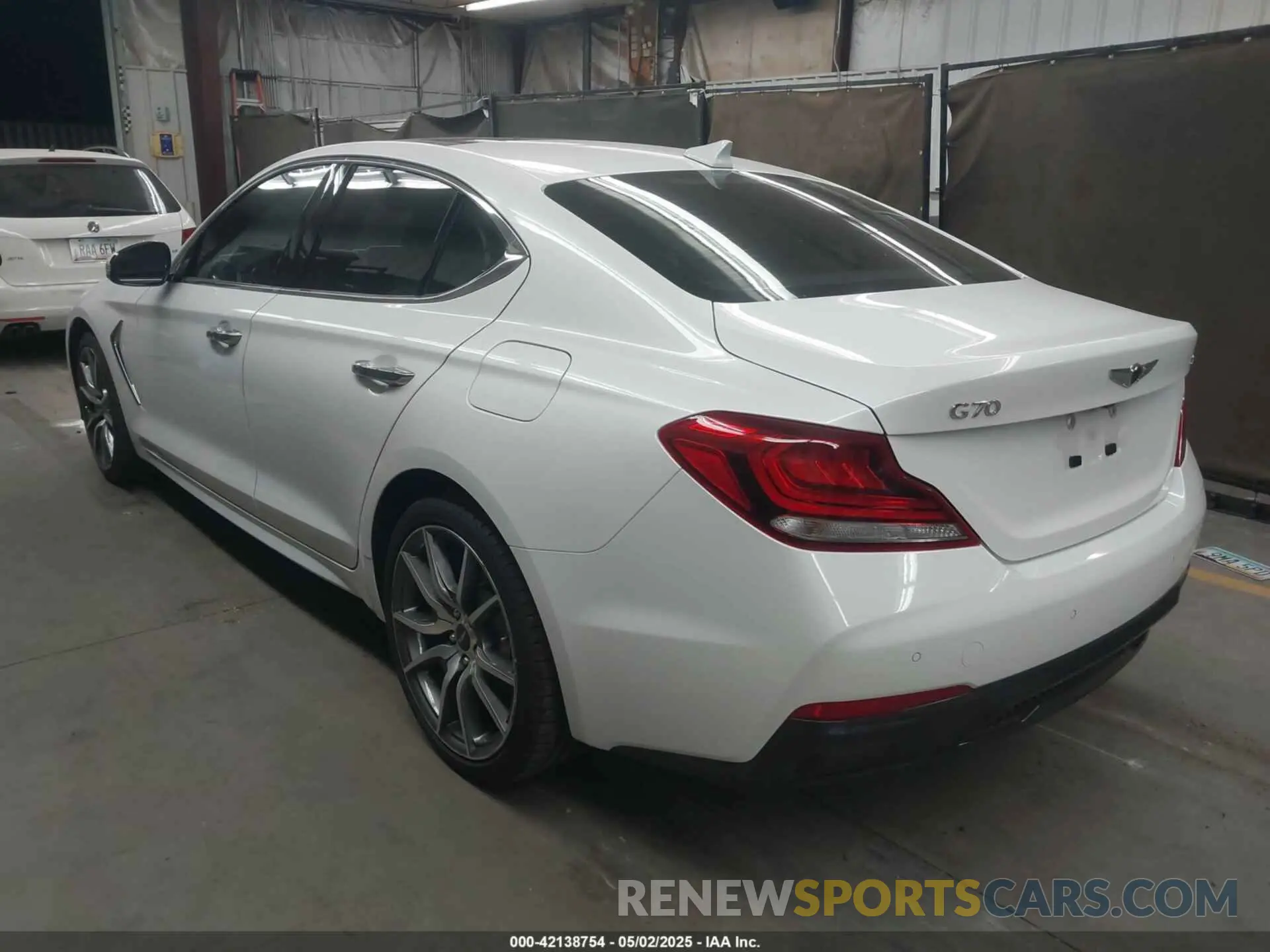 3 Photograph of a damaged car KMTG44LA2MU067102 GENESIS G70 2021