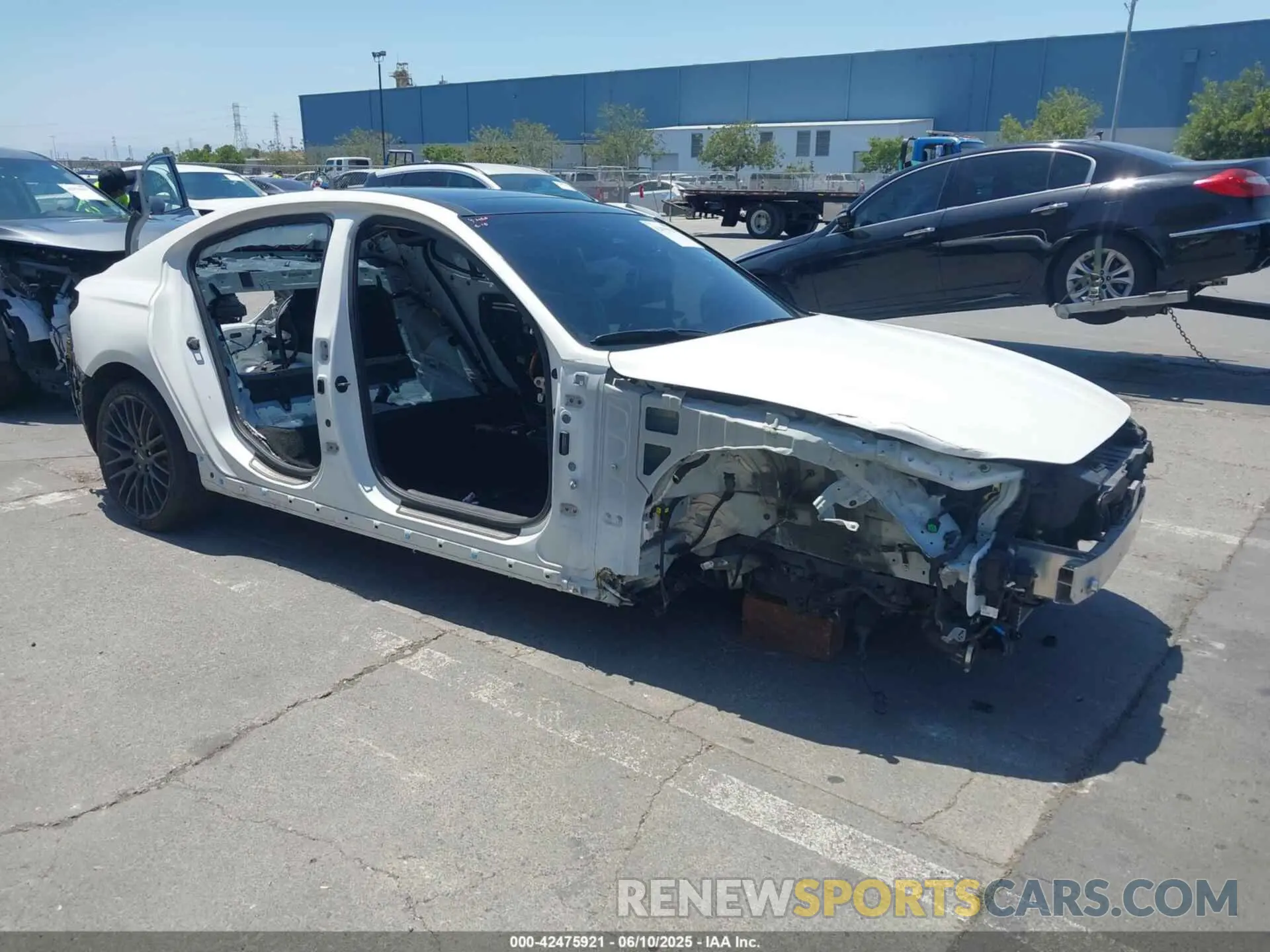 1 Photograph of a damaged car KMTG14TE2NU082213 GENESIS G70 2022