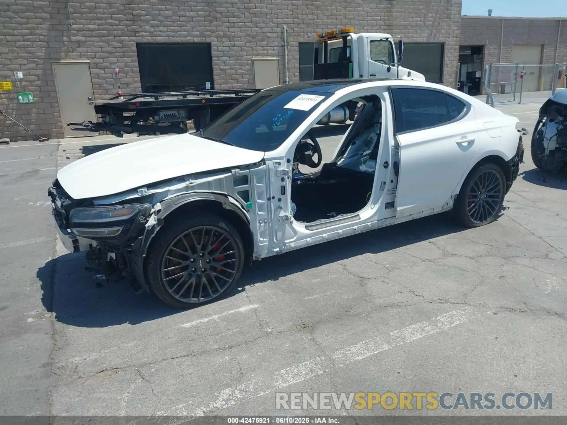 2 Photograph of a damaged car KMTG14TE2NU082213 GENESIS G70 2022