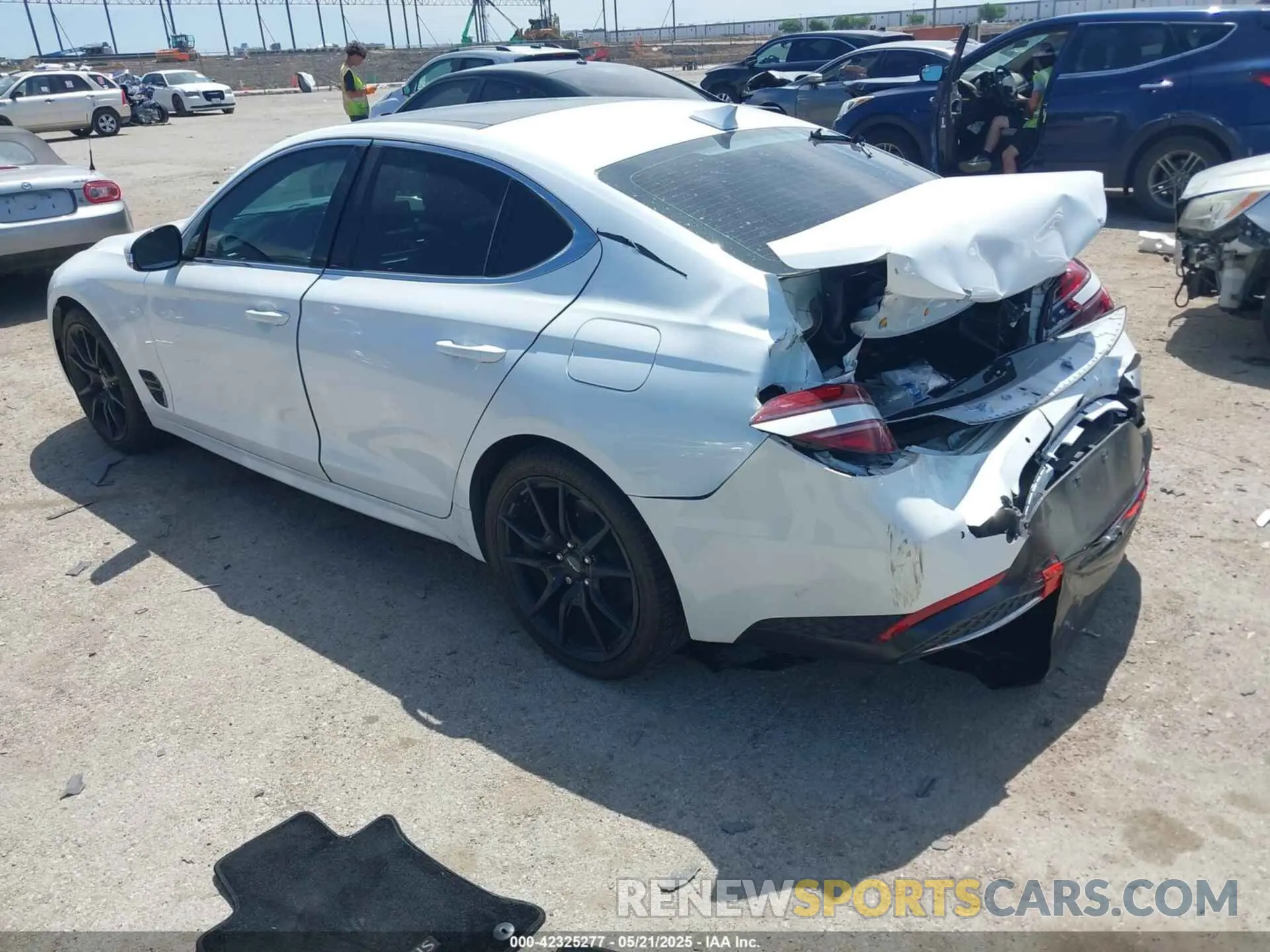 3 Photograph of a damaged car KMTG34TA5NU103935 GENESIS G70 2022