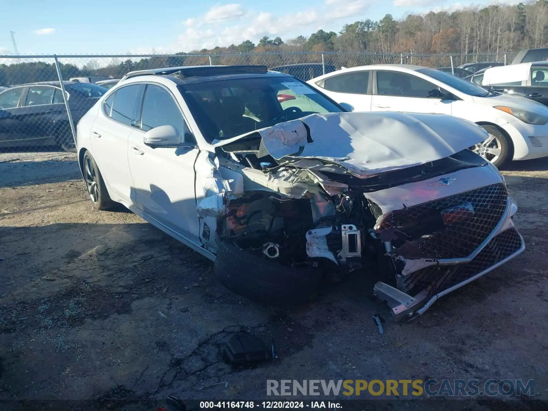 1 Photograph of a damaged car KMTG54TE0NU103029 GENESIS G70 2022