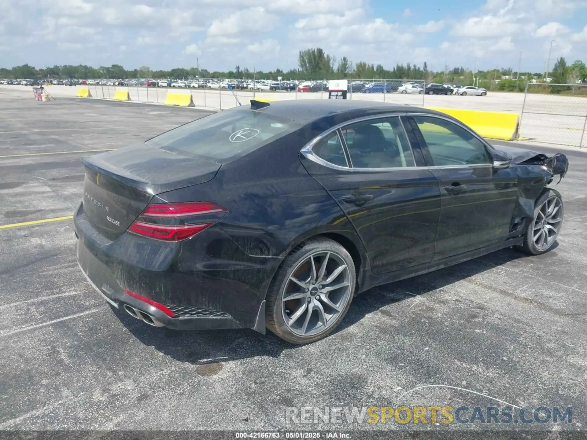 4 Photograph of a damaged car KMTG34TA3PU129713 GENESIS G70 2023