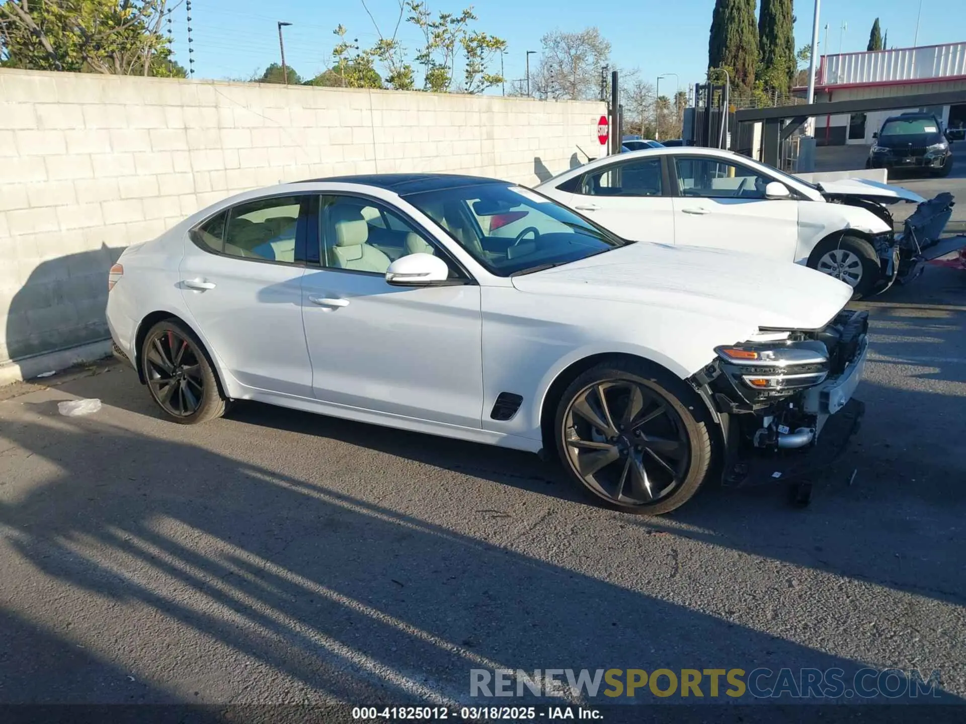 14 Photograph of a damaged car KMTG34TA7PU112073 GENESIS G70 2023