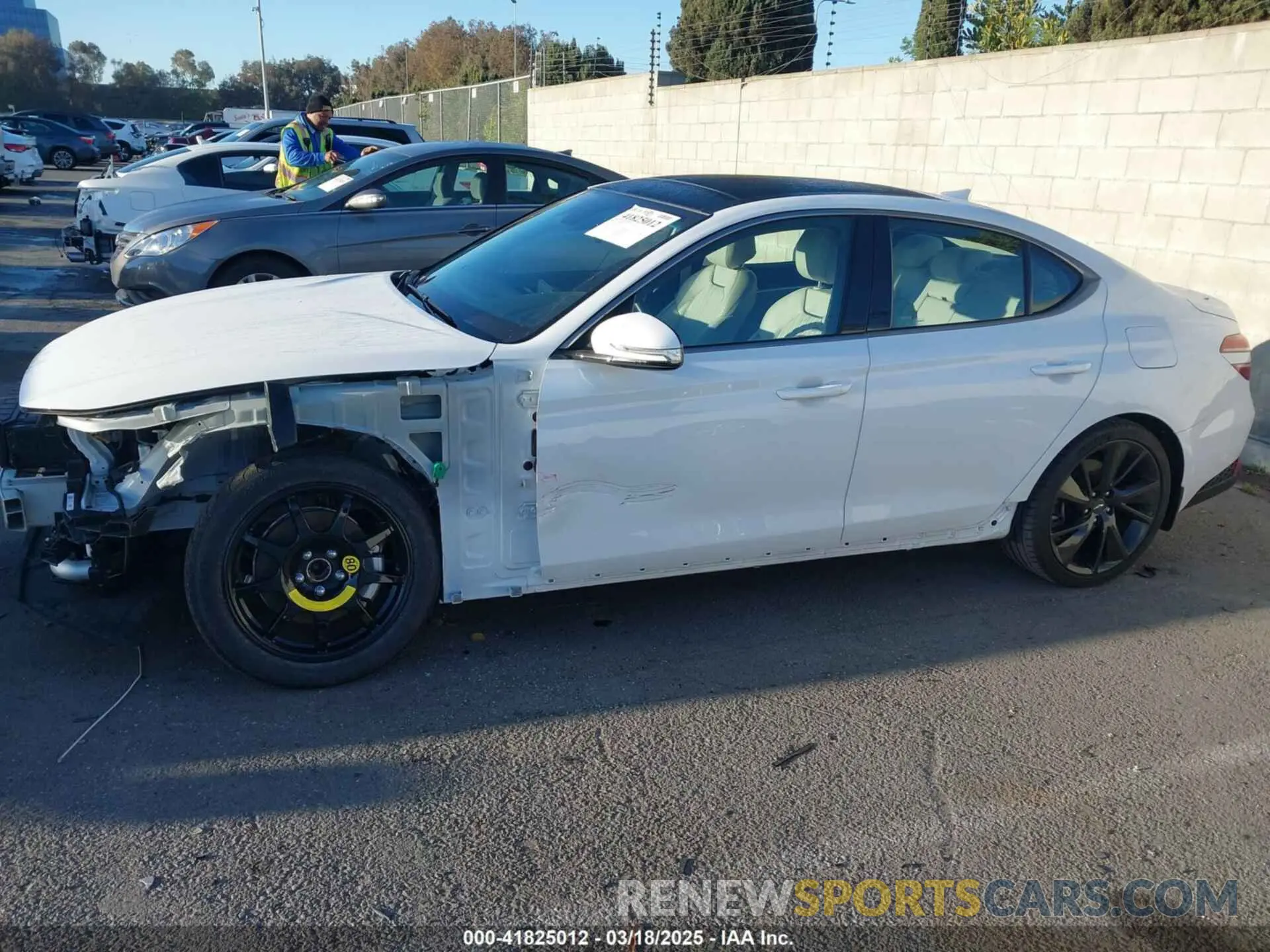 18 Photograph of a damaged car KMTG34TA7PU112073 GENESIS G70 2023