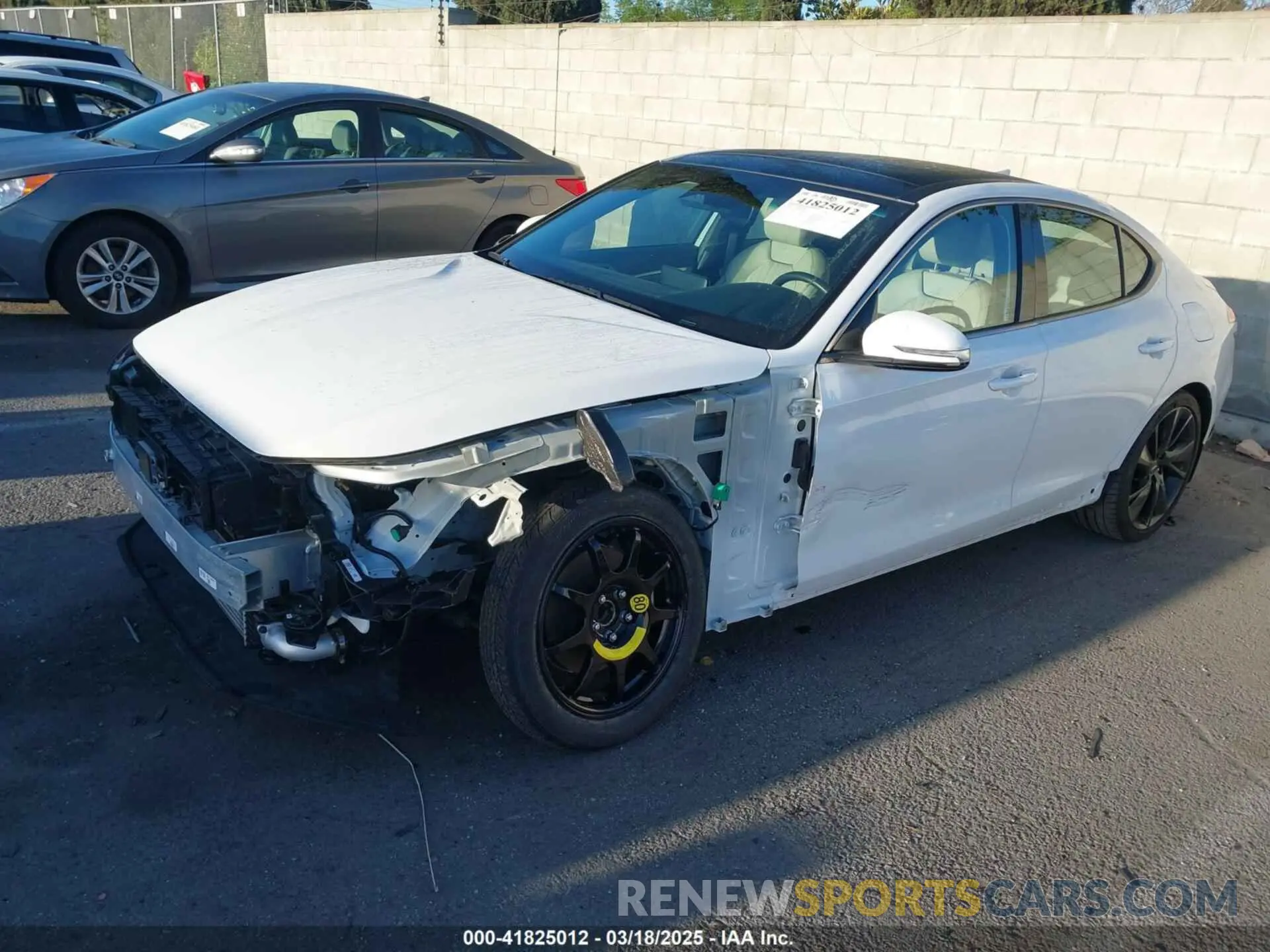 2 Photograph of a damaged car KMTG34TA7PU112073 GENESIS G70 2023