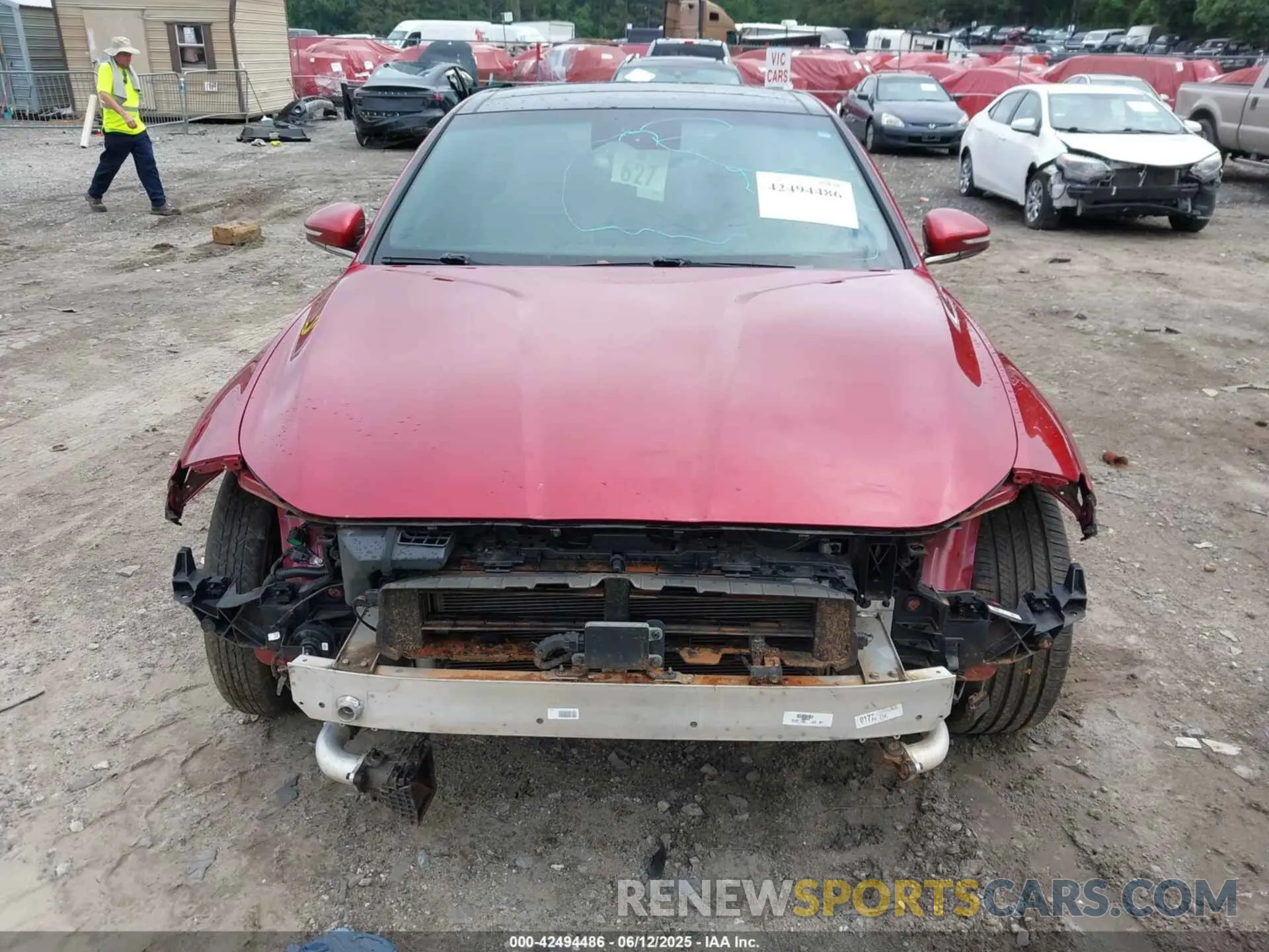 13 Photograph of a damaged car KMTG34TA8PU104595 GENESIS G70 2023