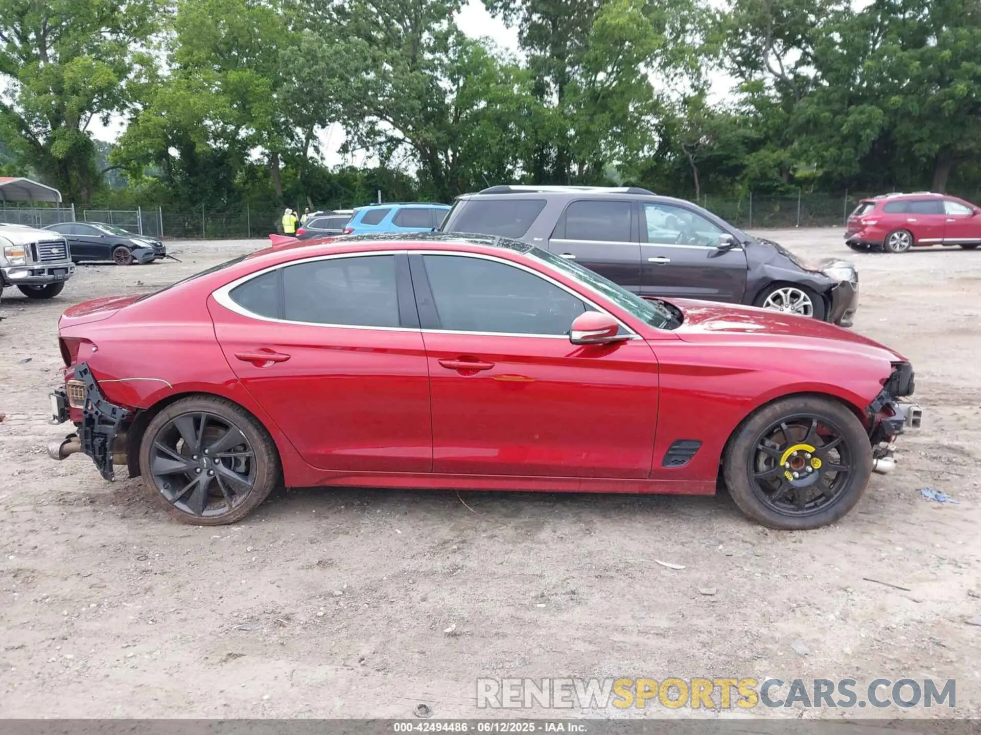 14 Photograph of a damaged car KMTG34TA8PU104595 GENESIS G70 2023
