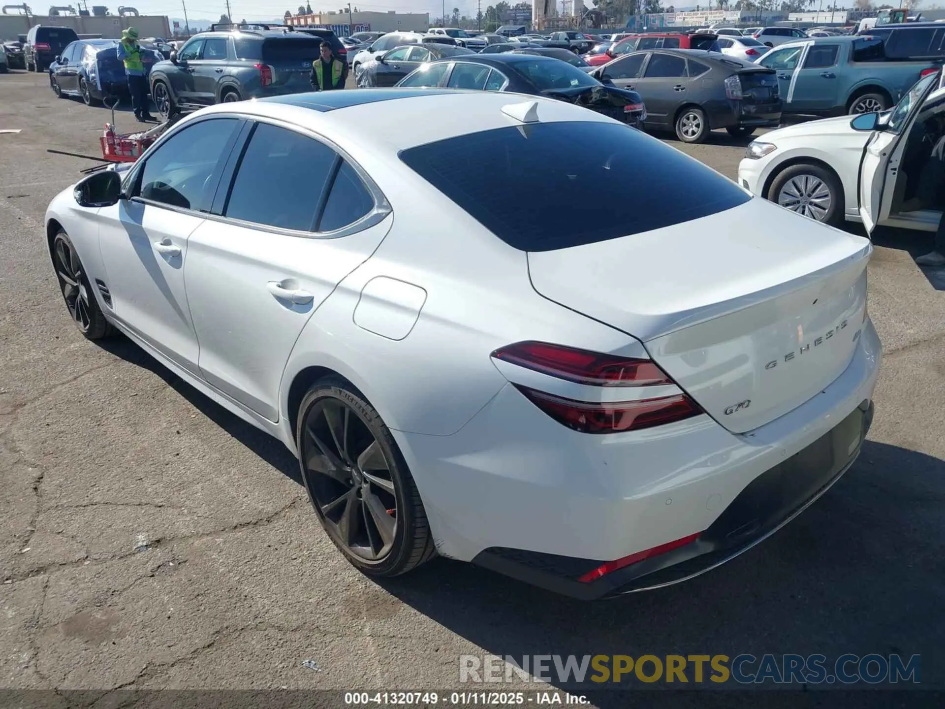 3 Photograph of a damaged car KMTG34TAXPU112861 GENESIS G70 2023