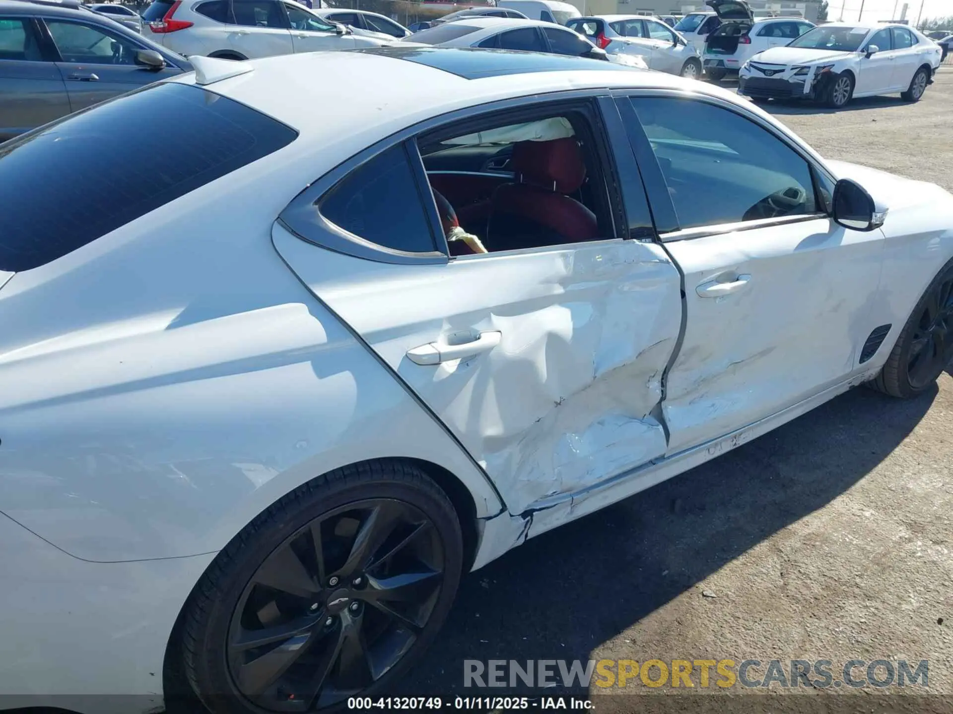 6 Photograph of a damaged car KMTG34TAXPU112861 GENESIS G70 2023