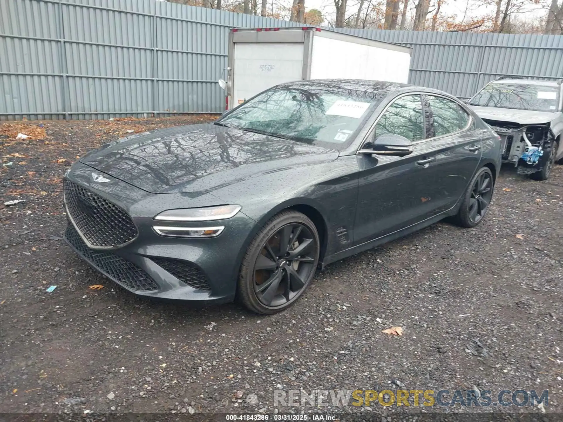 2 Photograph of a damaged car KMTG54TE6PU113485 GENESIS G70 2023