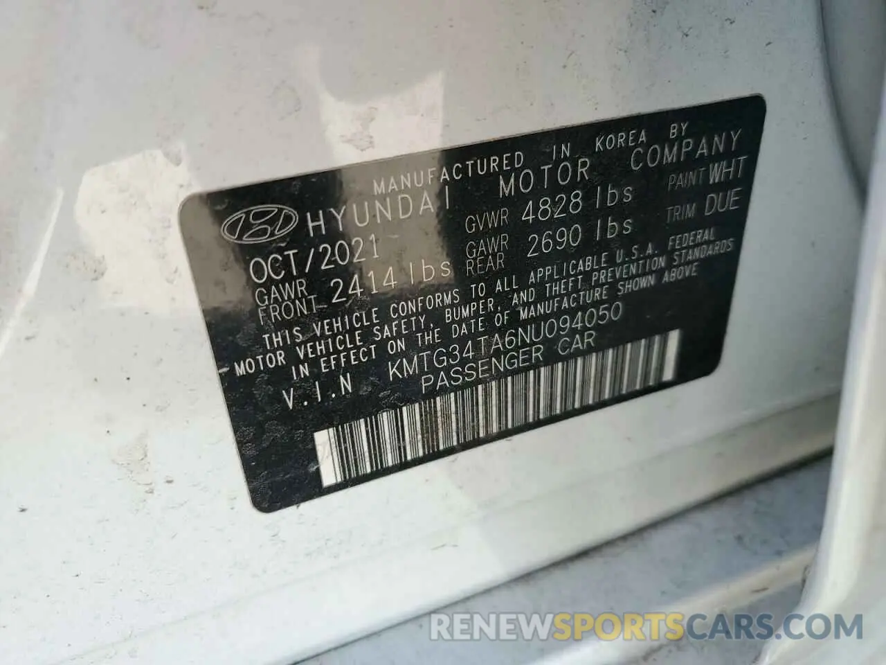 12 Photograph of a damaged car KMTG34TA6NU094050 GENESIS G70 BASE 2022