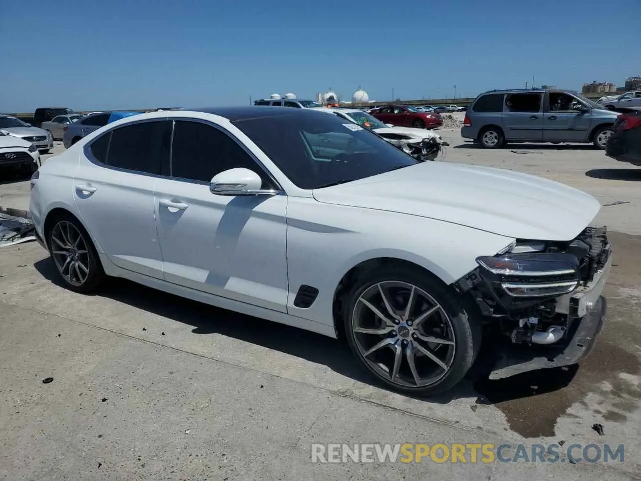 4 Photograph of a damaged car KMTG34TA6NU098521 GENESIS G70 BASE 2022