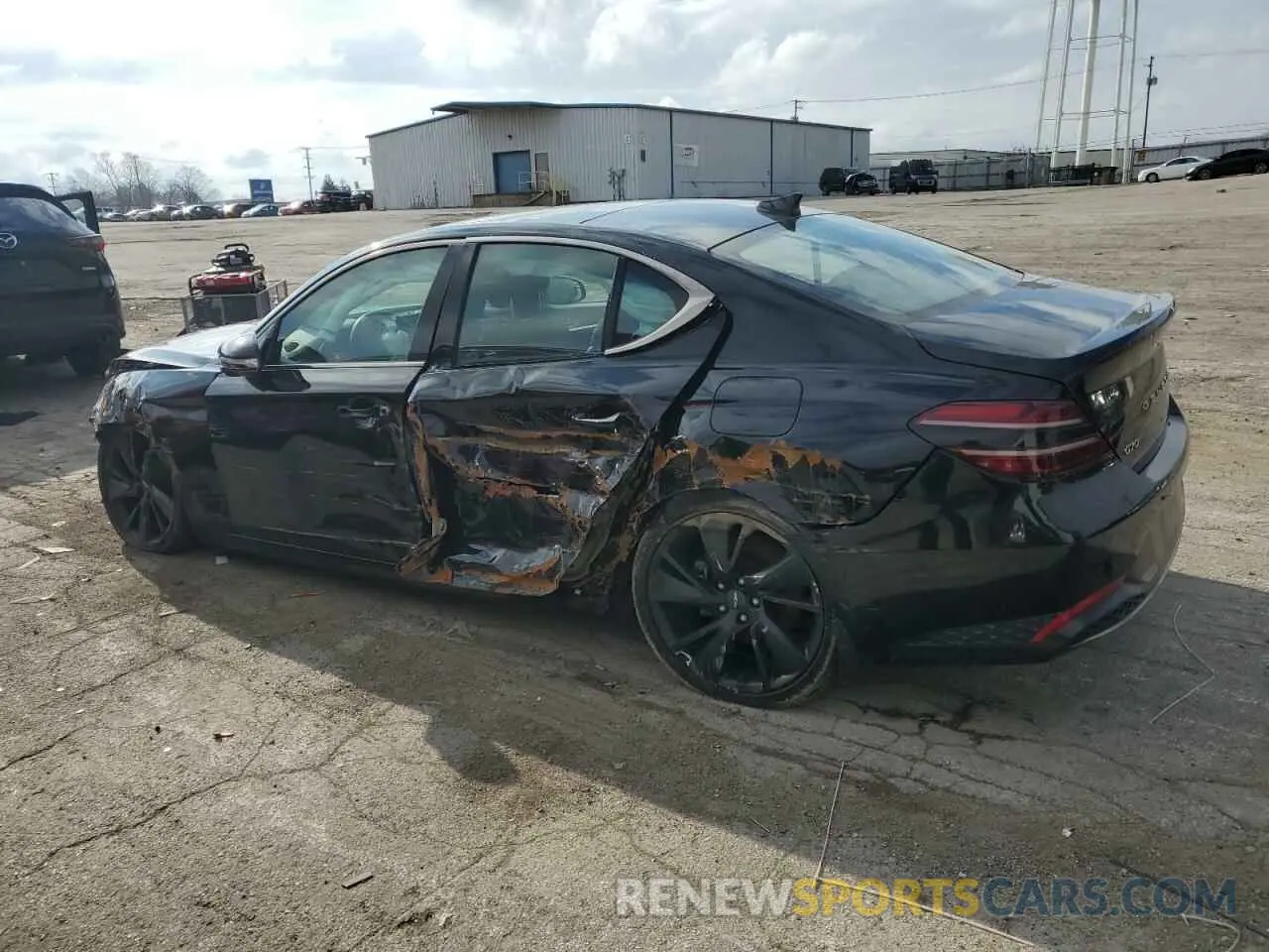 2 Photograph of a damaged car KMTG34TA4PU111219 GENESIS G70 BASE 2023