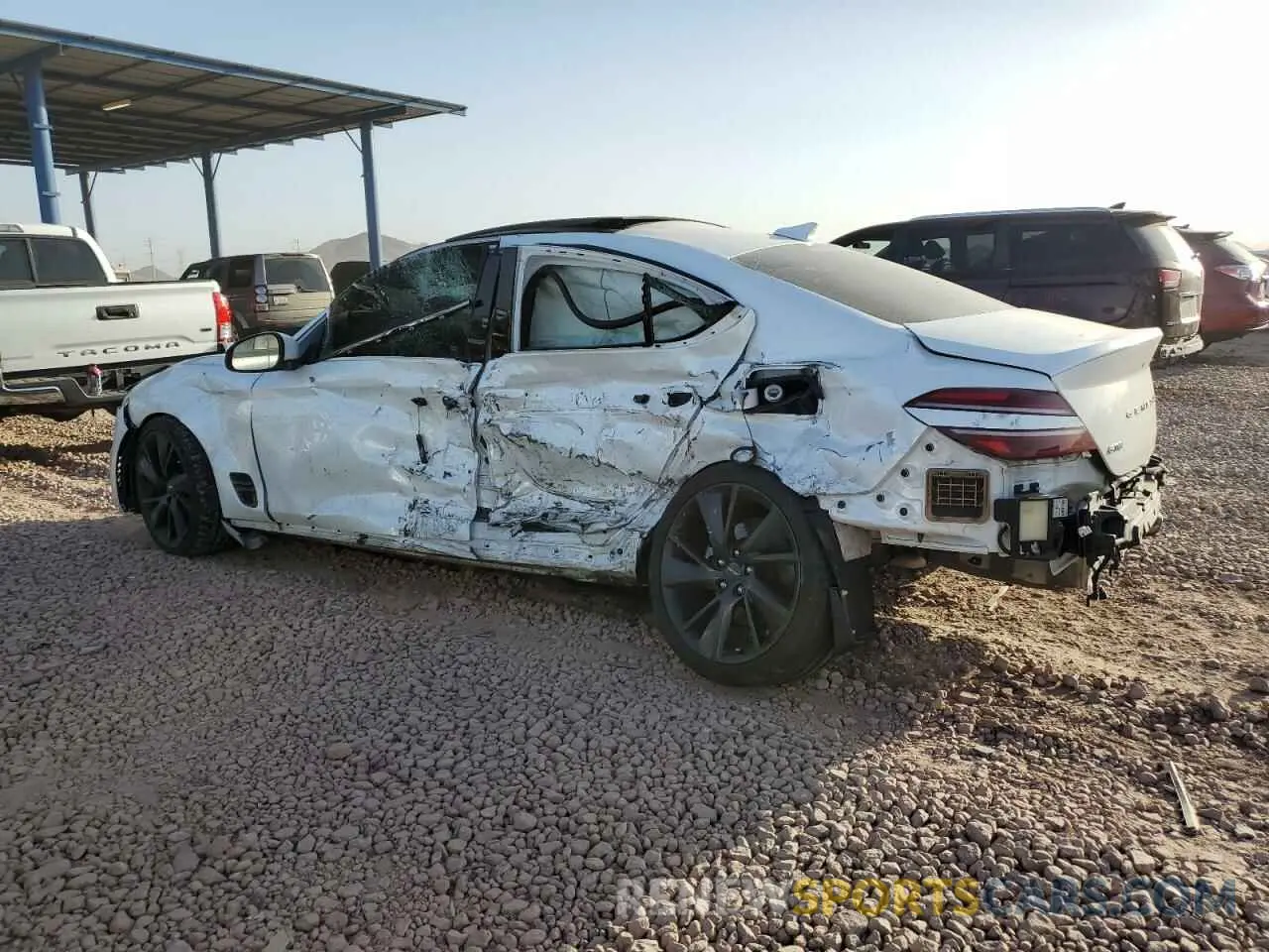 2 Photograph of a damaged car KMTG34TA8PU106895 GENESIS G70 BASE 2023