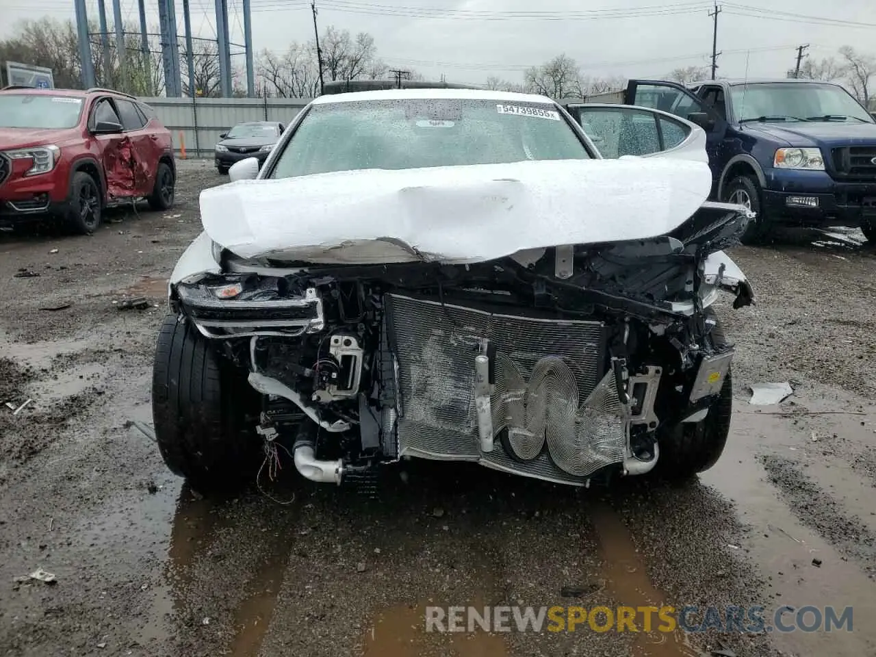 5 Photograph of a damaged car KMTG34TA9PU123771 GENESIS G70 BASE 2023