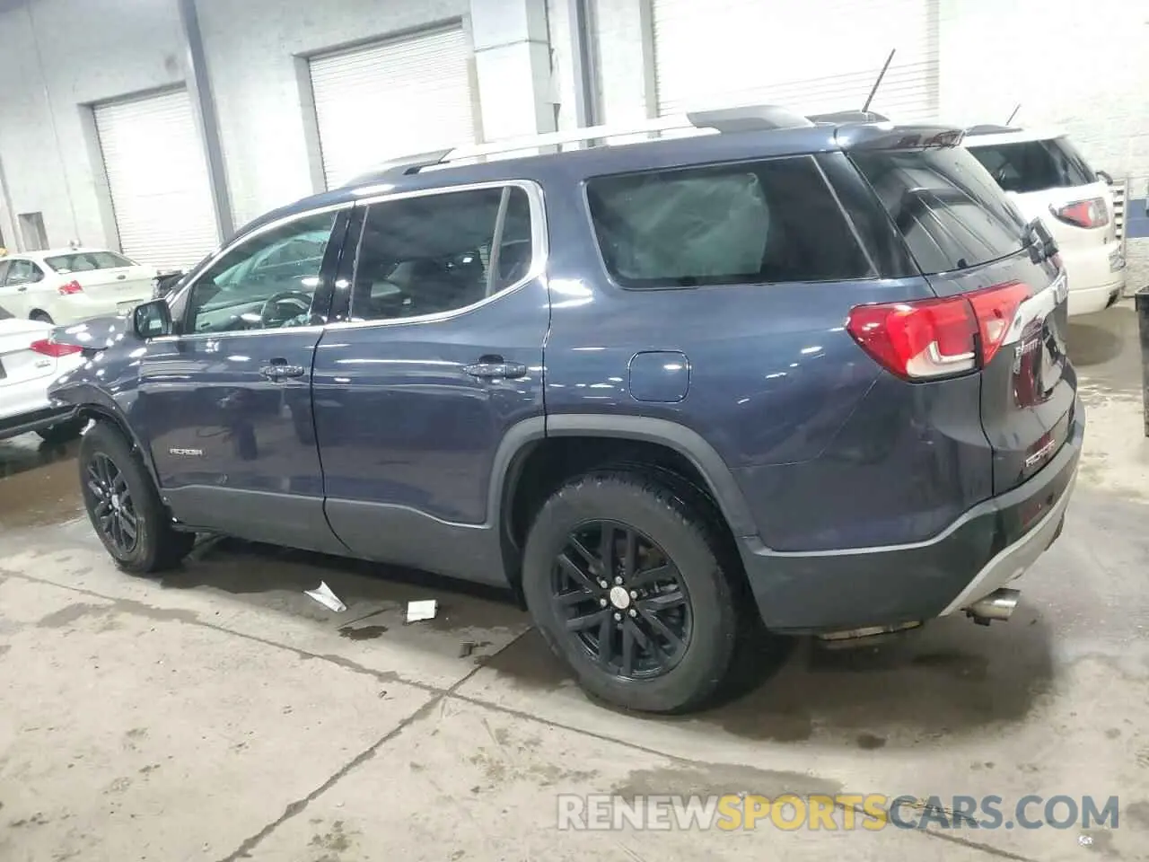 2 Photograph of a damaged car 1GKKNMLSXKZ118705 GMC ACADIA 2019