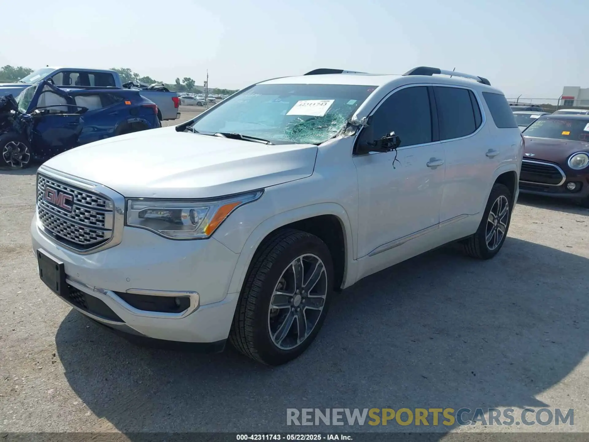 2 Photograph of a damaged car 1GKKNPLS0KZ221309 GMC ACADIA 2019