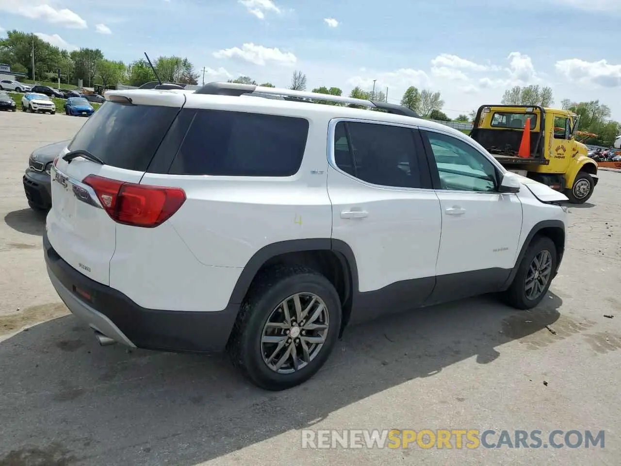 3 Photograph of a damaged car 1GKKNULS3KZ283611 GMC ACADIA 2019