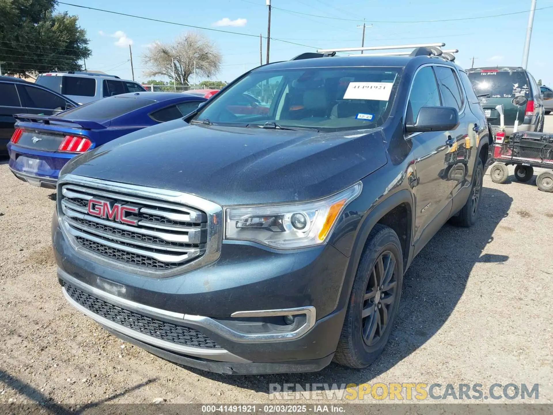 2 Photograph of a damaged car 1GKKNULS7KZ271767 GMC ACADIA 2019
