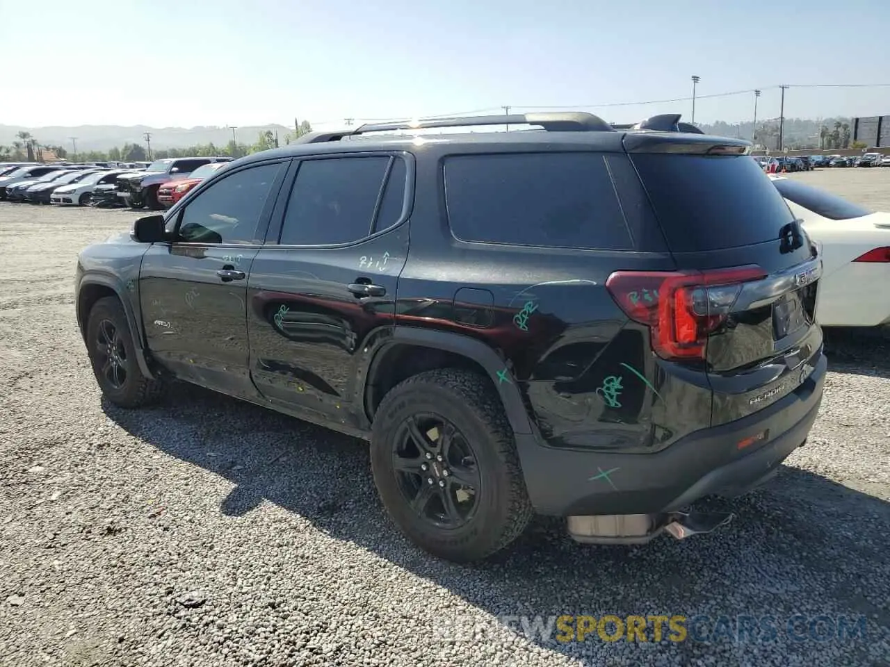 2 Photograph of a damaged car 1GKKNLLS3LZ115642 GMC ACADIA 2020