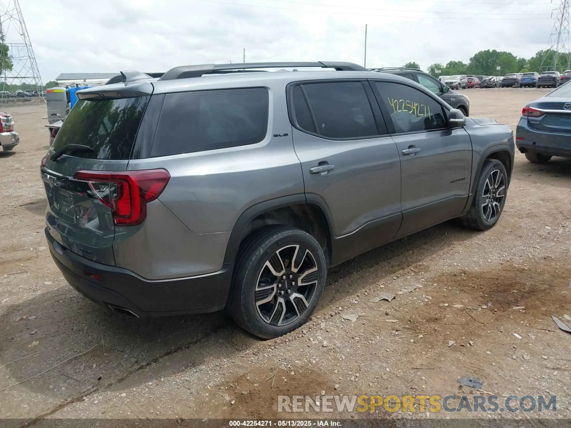 4 Photograph of a damaged car 1GKKNRLS1MZ173110 GMC ACADIA 2021