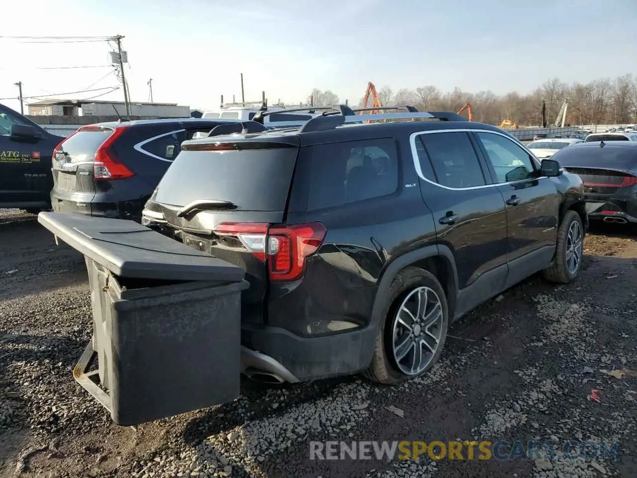 3 Photograph of a damaged car 1GKKNULS6NZ178548 GMC ACADIA 2022