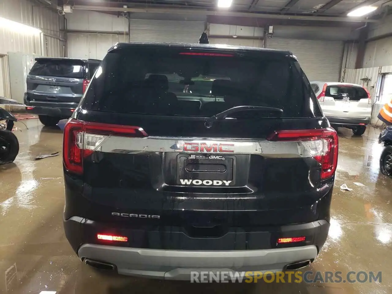 6 Photograph of a damaged car 1GKKNKL42PZ242450 GMC ACADIA 2023