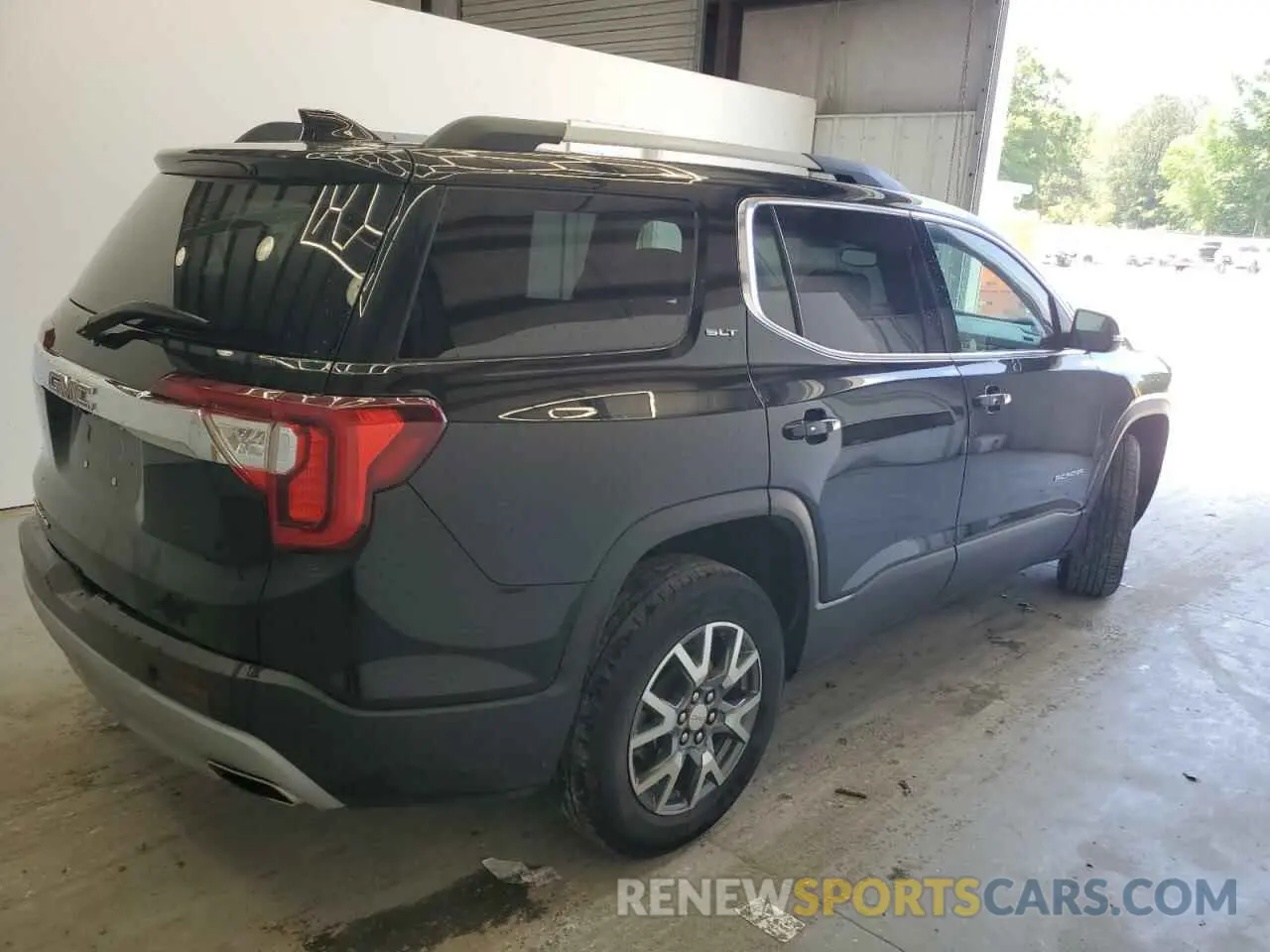 3 Photograph of a damaged car 1GKKNML46PZ242365 GMC ACADIA 2023
