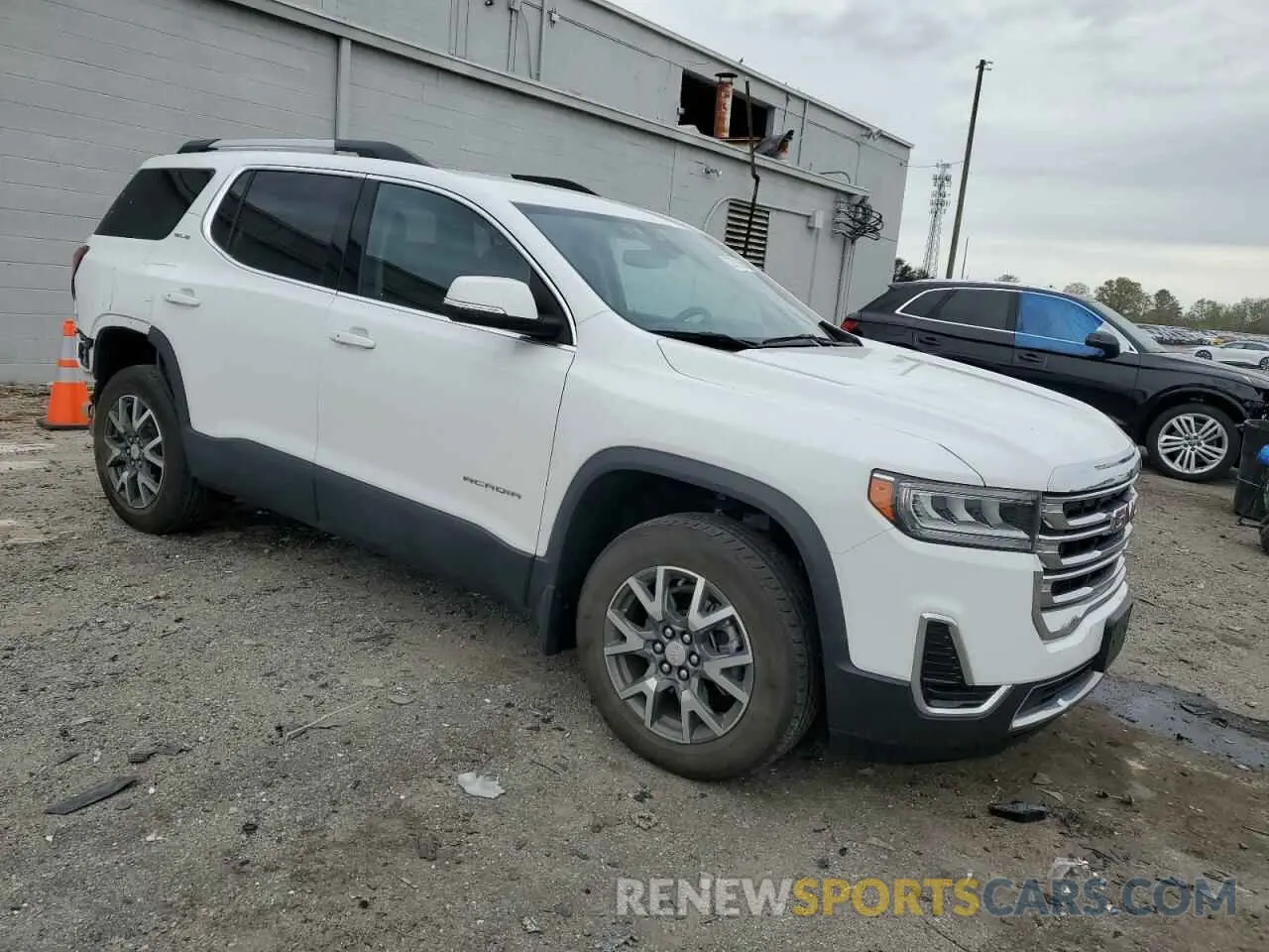 4 Photograph of a damaged car 1GKKNRL41PZ238009 GMC ACADIA 2023