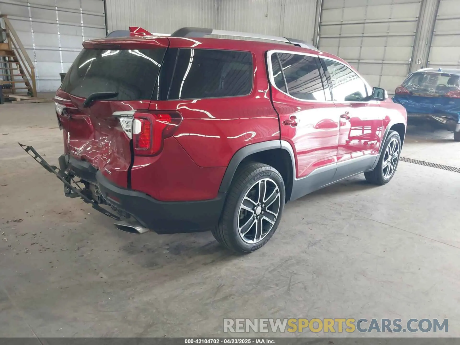 4 Photograph of a damaged car 1GKKNULS2PZ220880 GMC ACADIA 2023