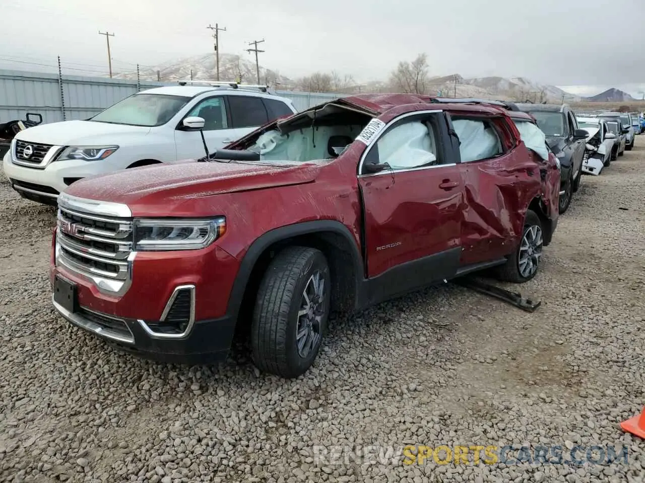 1 Photograph of a damaged car 1GKKNULS6PZ228609 GMC ACADIA 2023