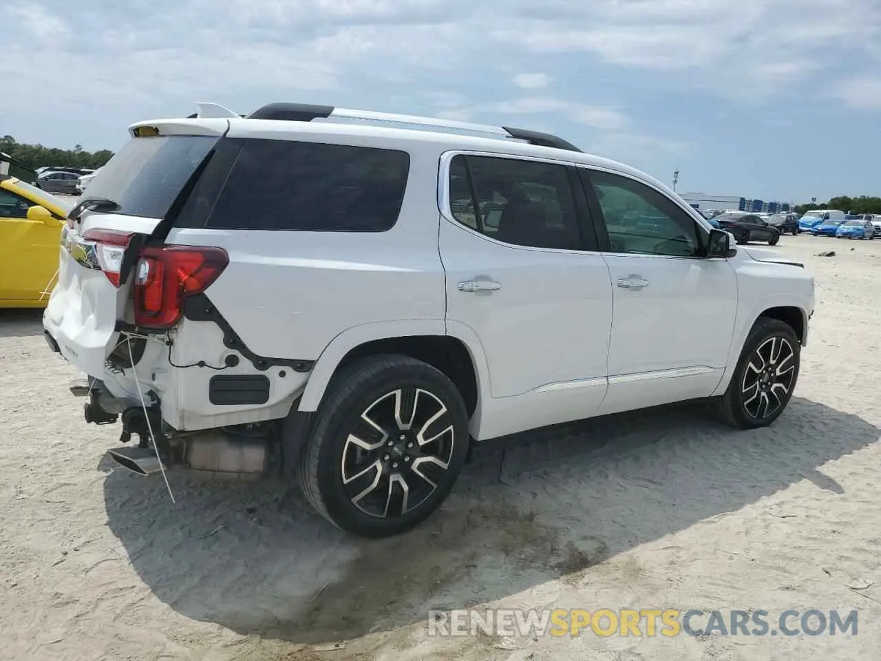 3 Photograph of a damaged car 1GKKNXLS1NZ140775 GMC ACADIA DEN 2022