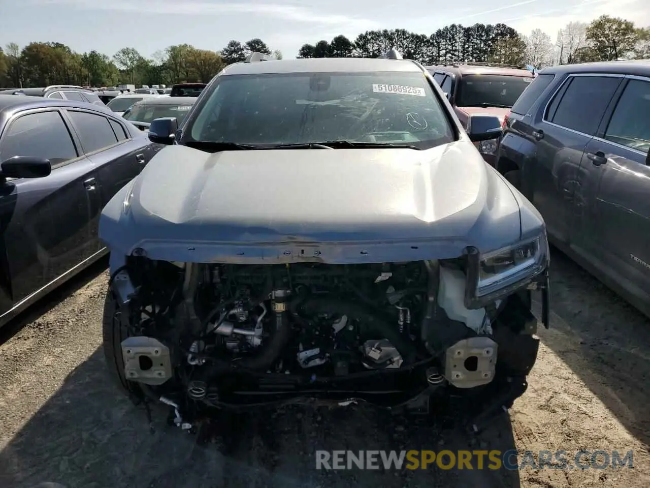 5 Photograph of a damaged car 1GKKNPL4XPZ228244 GMC ACADIA DEN 2023
