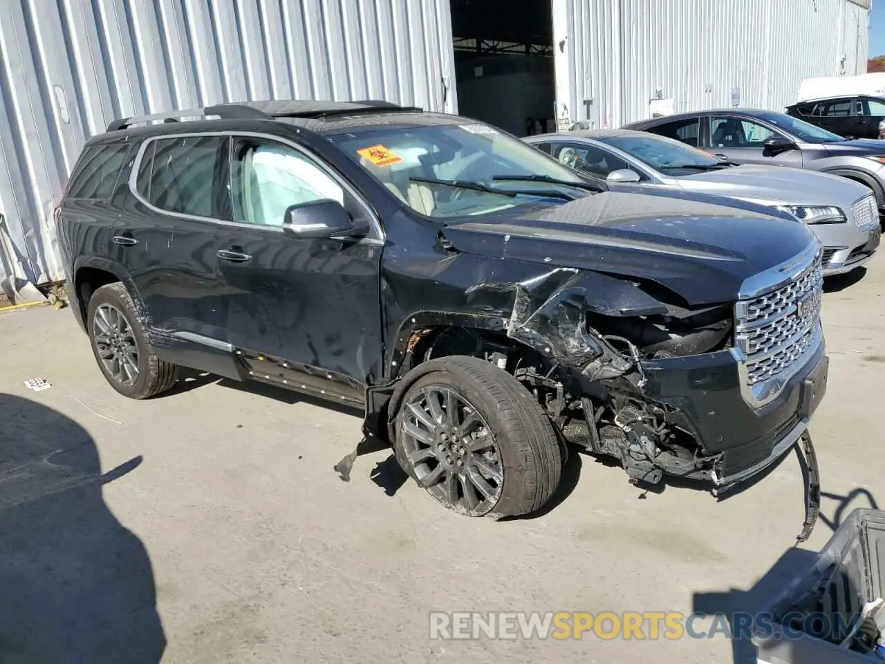 4 Photograph of a damaged car 1GKKNXLS9PZ192108 GMC ACADIA DEN 2023