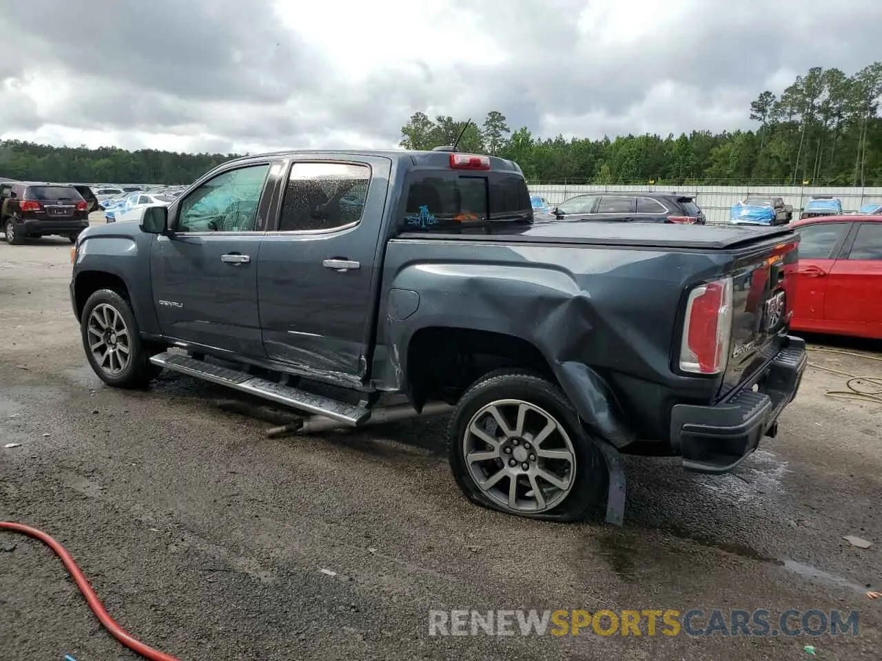 2 Photograph of a damaged car 1GTG6EEN6K1272872 GMC CANYON 2019