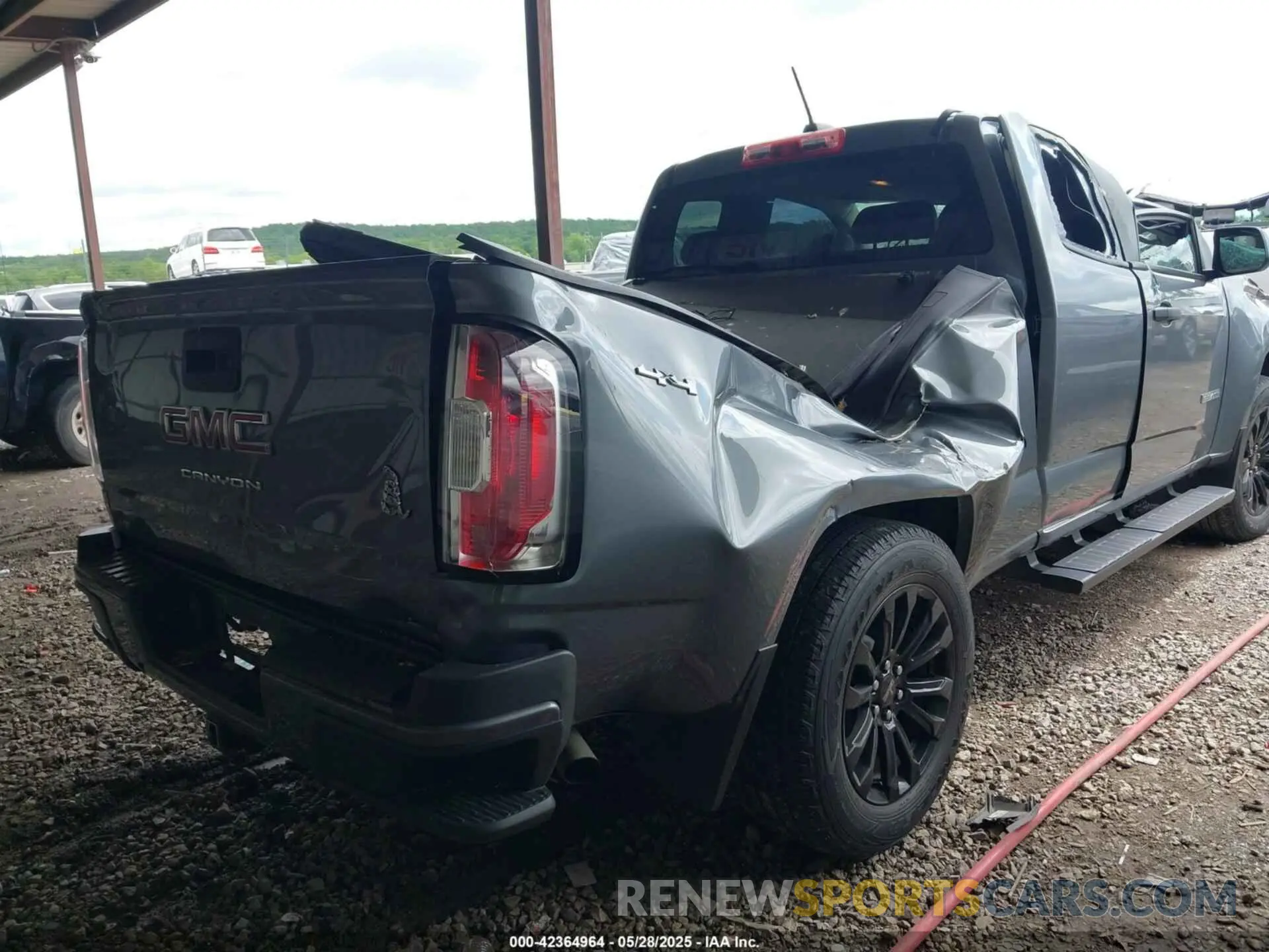 4 Photograph of a damaged car 1GTH6BEN6N1203770 GMC CANYON 2022