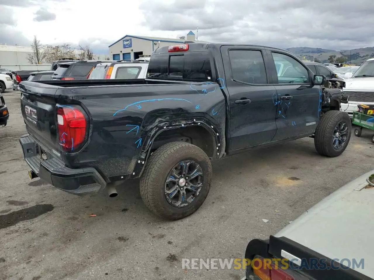 3 Фотография поврежденного автомобиля 1GTP5BEK8P1195517 GMC CANYON 2023