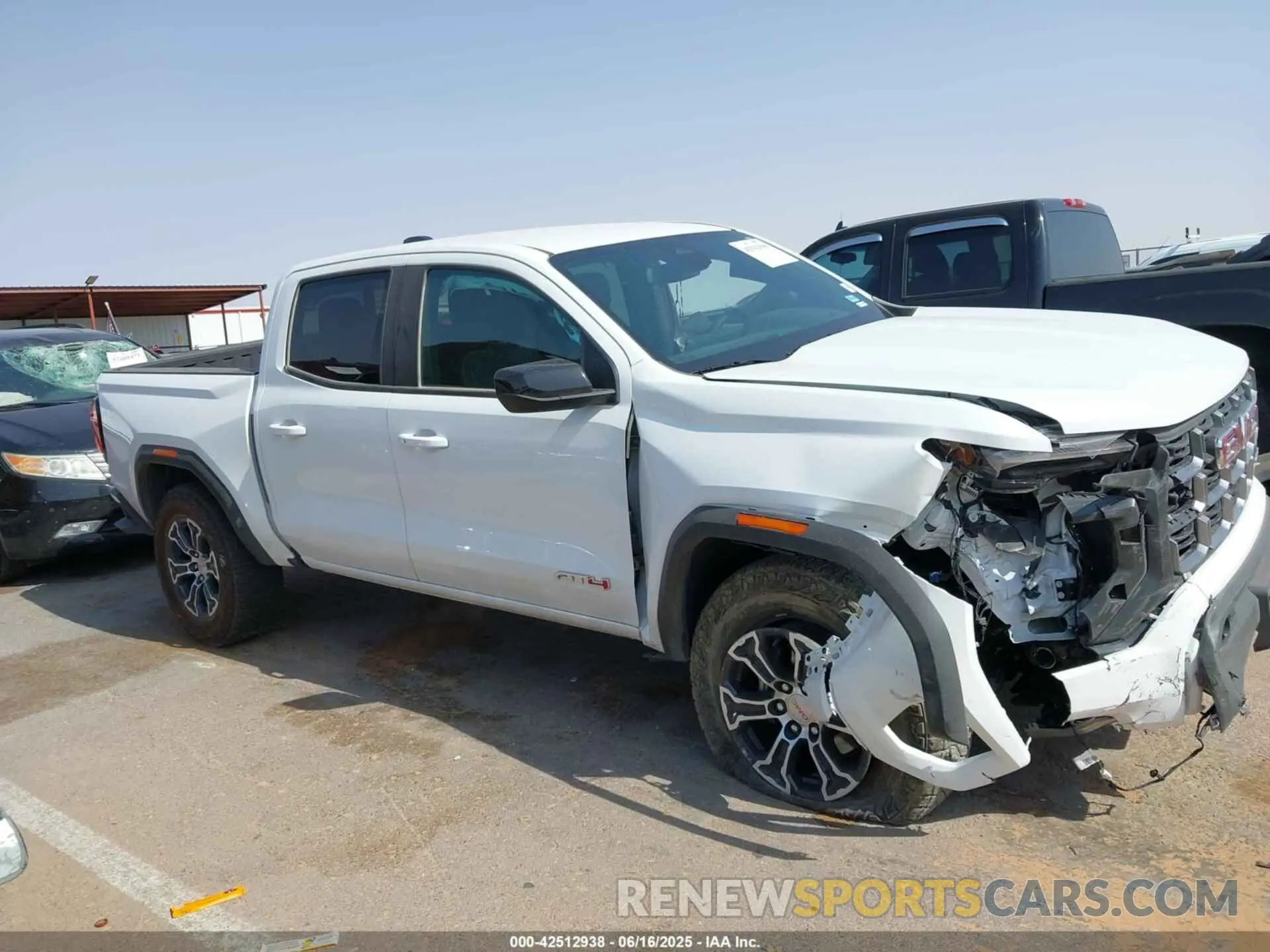 13 Photograph of a damaged car 1GTP6DEK4R1247026 GMC CANYON 2024