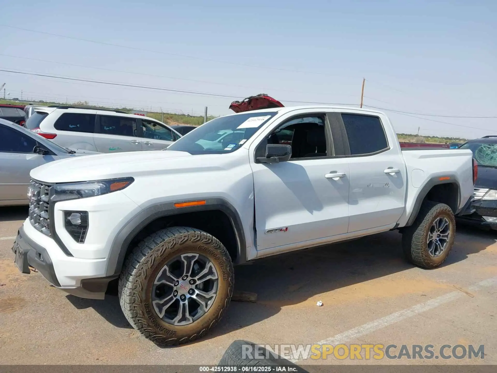 14 Photograph of a damaged car 1GTP6DEK4R1247026 GMC CANYON 2024