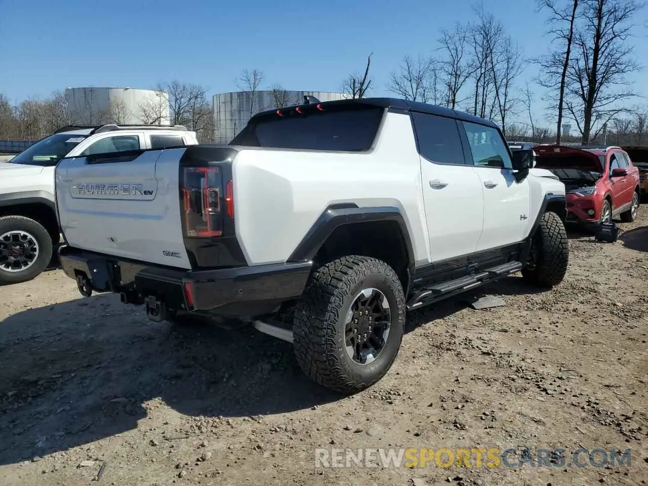 3 Фотография поврежденного автомобиля 1GT40FDAXNU100033 GMC HUMMER PIC 2022