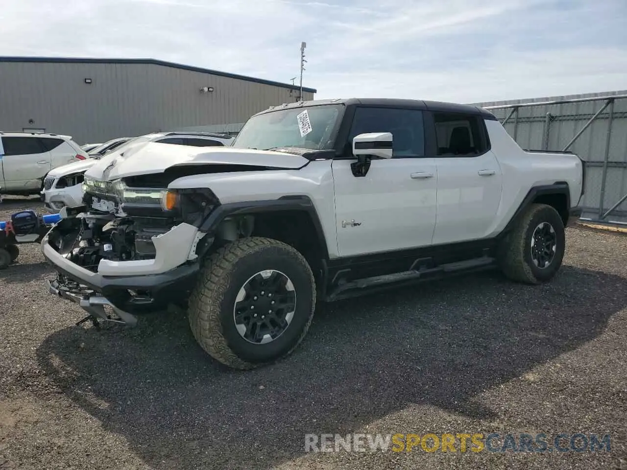 1 Photograph of a damaged car 1GT40FDA7PU100073 GMC HUMMER PIC 2023